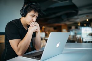 male student staring at his computer